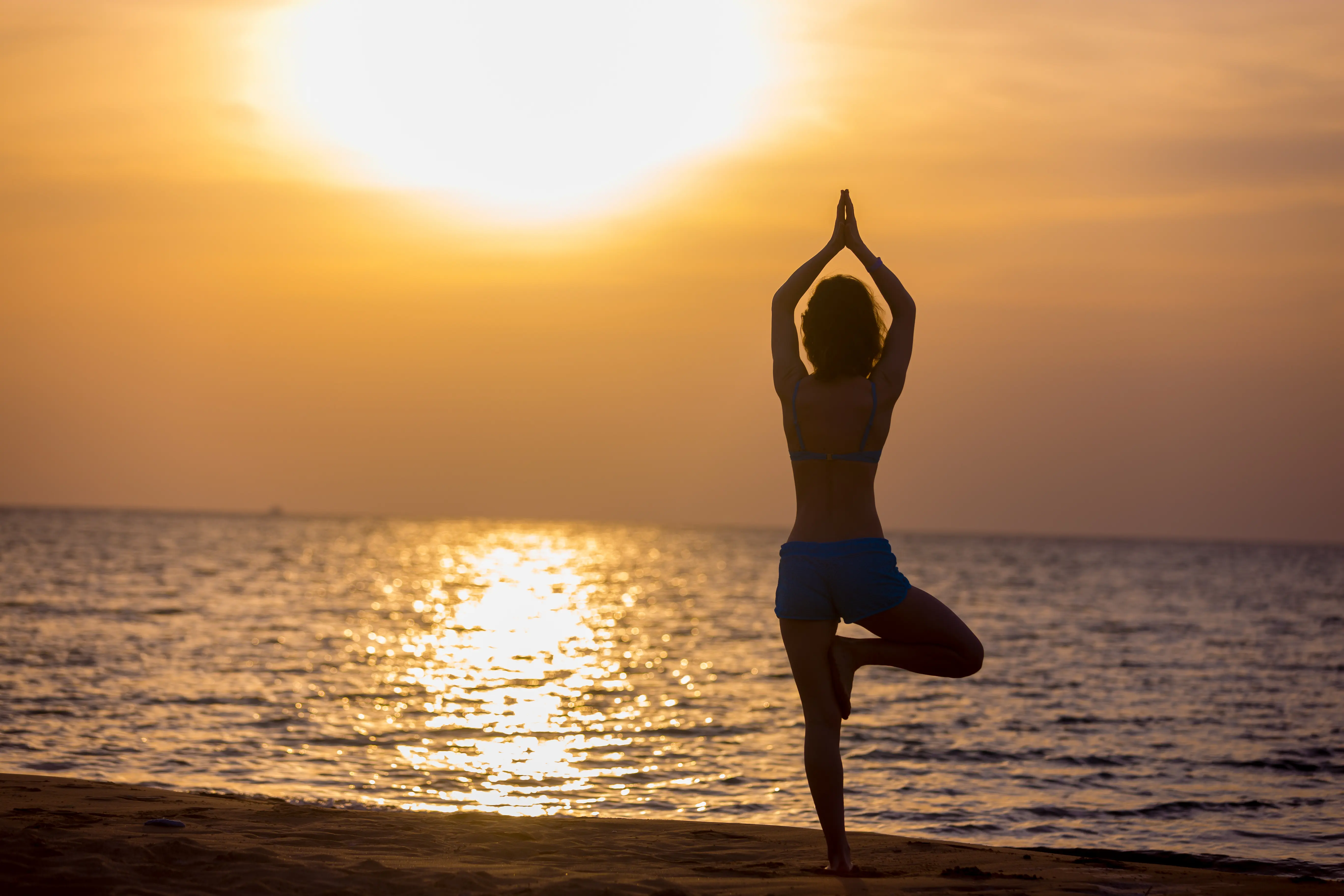 Sunrise yoga on the beach
